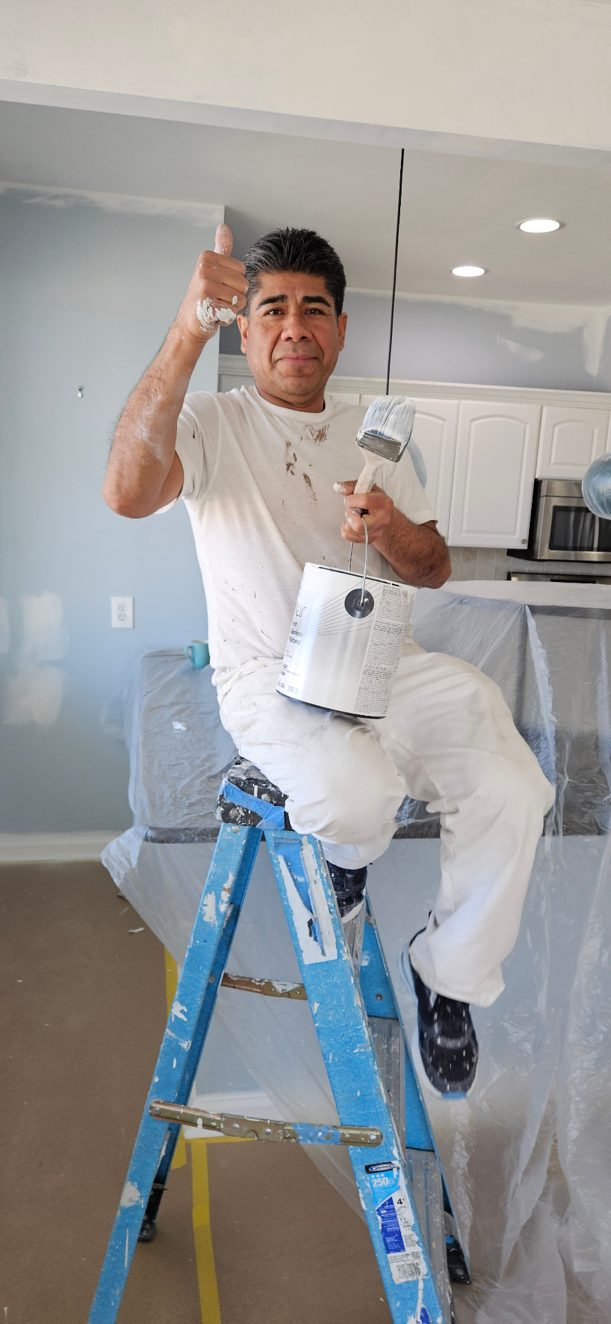 Ariano 'El Primo' Abad, owner of 5 Quick Brushes, on the job in New Jersey
